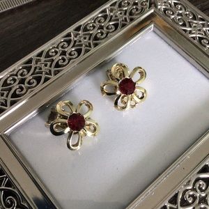 Vintage red and gold tone clip flower earrings.